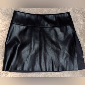 Tiger mini skirt with Slide slit on thigh in perfect condition.